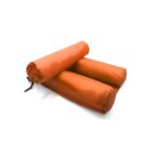 Orange inflatable pillows designed for travel, shown rolled and unrolled. Their compact design suggests easy portability.