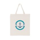 A beige tote bag with a design featuring a blue anchor inside a teal circular pattern with arrow-like shapes.