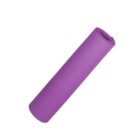 A rolled-up purple yoga mat isolated on a white background.