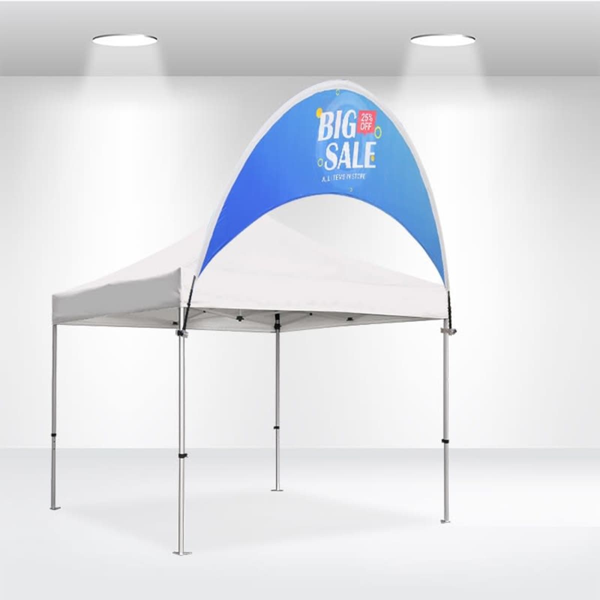 A white popup canopy tent with a blue half-circle banner that reads BIG SALE 25% OFF in white and red lettering is set up in a well-lit space with white walls and a high ceiling.