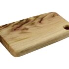 A wooden cutting board with a smooth, rectangular shape and rounded edges. It has a natural wood grain pattern with a small circular hole in one corner for hanging or carrying.