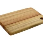 A wooden cutting board with a light brown, striped finish featuring a small circular hole in one corner.