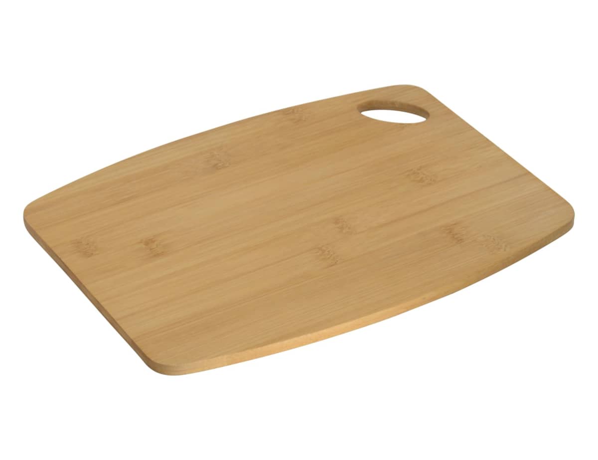 A rectangular bamboo cutting board with rounded edges and a cutout handle in one corner, isolated on a white background.