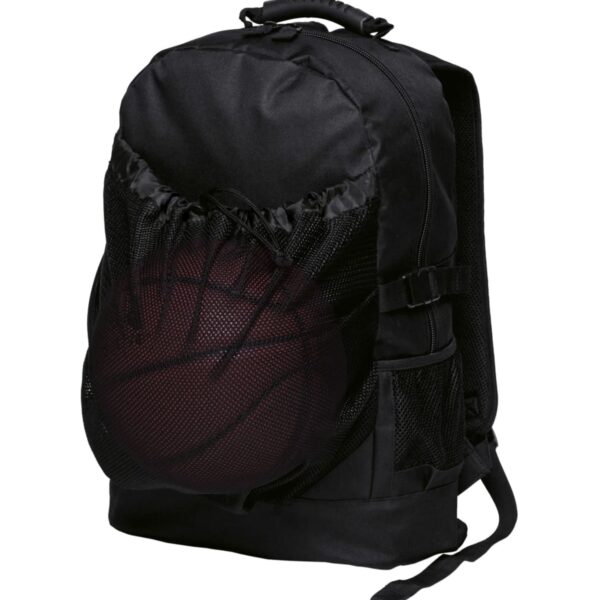 A black backpack with a basketball held in a front mesh pocket, featuring adjustable straps and a top handle. The bag is designed for sports and everyday use.