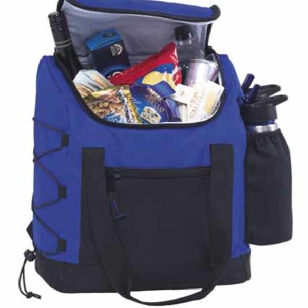 A blue and black cooler bag filled with various snacks and drinks, including chips, bottled water, and other packaged items. The bag has handles, a zippered front pocket, and a side drink holder with a bottle inside.
