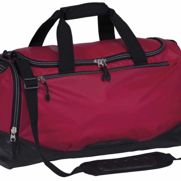 A red and black sports duffel bag with multiple zippered compartments and an adjustable shoulder strap.