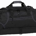 A black duffel bag with multiple compartments and zippers, featuring reinforced handles on top.