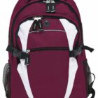 A maroon and white backpack with multiple compartments, black zippers, and side mesh pockets. It has a top handle and adjustable shoulder straps. The design features a prominent white pattern on the front.