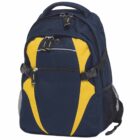 A navy blue backpack with yellow accents, featuring multiple zippered compartments and mesh pockets on the sides. The backpack has adjustable straps and sturdy handles.