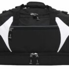 A black and white sports duffel bag with multiple compartments and zippers. The bag has a handle on top for easy carrying and features a design with large white curved panels on the sides.