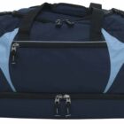 A large navy blue sports duffel bag with light blue accents, featuring multiple zippered compartments and black handles.