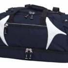 A blue and white sports duffel bag with multiple zippered compartments and black handles.
