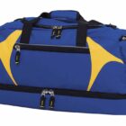 A large blue sports duffel bag with yellow accents and black straps. It has multiple zippered compartments, including a main compartment and side pockets. The zippers have black pulls with yellow details.