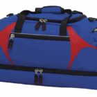 A blue and red sports duffel bag with black handles and multiple zippered compartments, including a large main section and a separate bottom pocket.