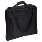 A black garment bag with a handle and adjustable shoulder strap. The bag features zippered compartments and a streamlined design, ideal for carrying suits or dresses while traveling.