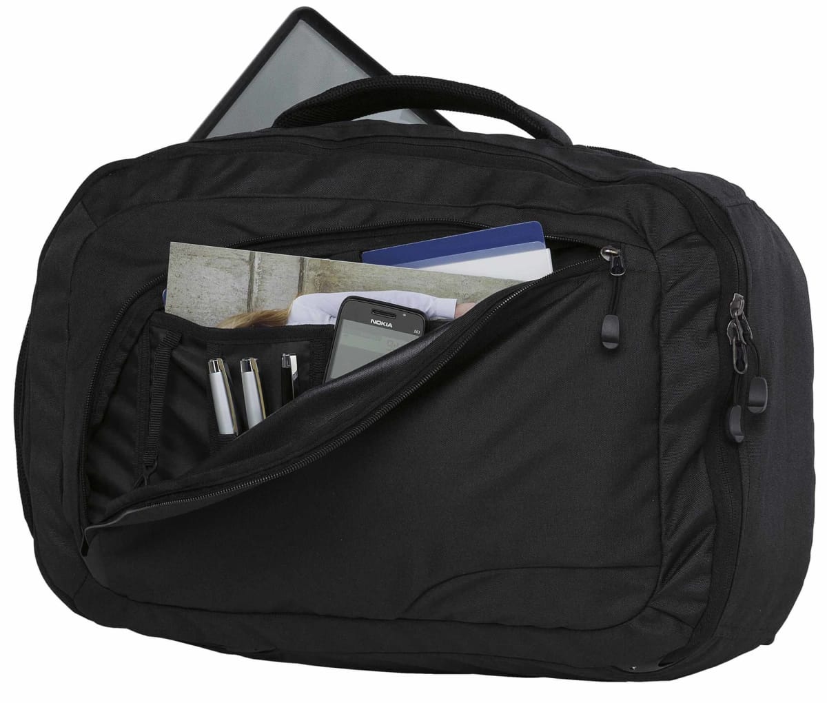 A black travel backpack with a front zipper pocket partially open, revealing pens, a book, and a smartphone. The main compartment is unzipped with a laptop slightly visible inside.