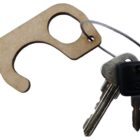 Keychain with two silver keys, a black plastic key, and a wooden touch tool featuring a hook and a circular opening. The keys are attached with a wire loop.