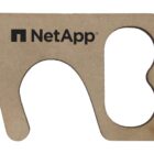 Cardboard cutout with a unique shape featuring the NetApp logo.