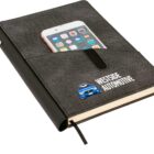 A black notebook with a pen attached and a front pocket containing a smartphone. The notebook is labeled Westside Automotive with a graphic of a blue car.