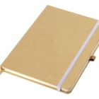 A closed tan notebook with a white elastic band and a ribbon bookmark, placed on a white surface. The notebook has rounded corners and a simple, minimalist design.