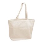 A plain beige canvas tote bag with two long handles. The bag is empty and standing upright, showcasing its simple design and neutral color.