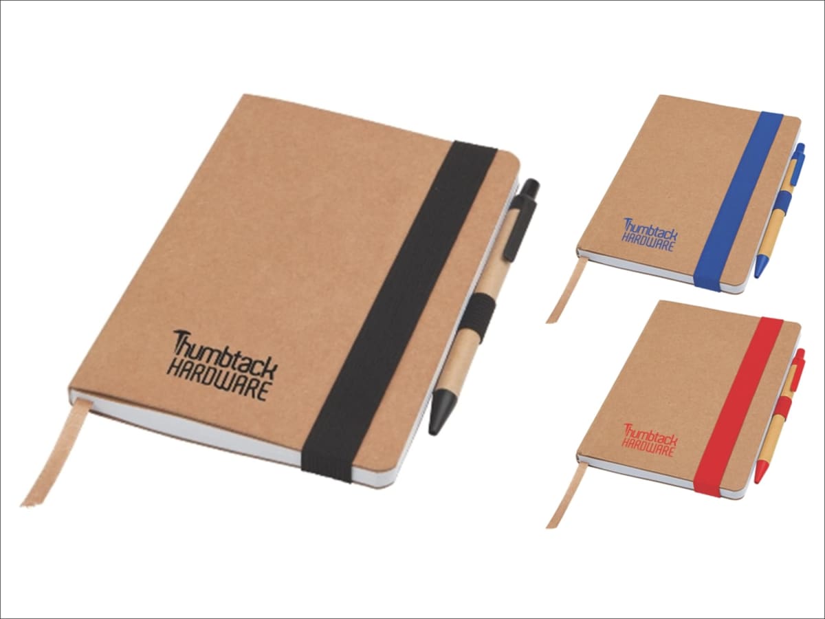 Three notebooks with brown covers, labeled Thumbtack Hardware, featuring black, blue, and red spines and matching pens attached. The black notebook is larger and in the foreground, while the blue and red are smaller in the background.