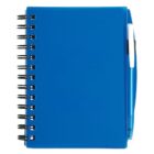 Blue spiral-bound notebook with a pen attached to the side. The notebook cover is closed, and the spiral binding is on the left side. The pen is blue and white, clipped securely to the notebook.
