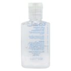 A small, clear plastic bottle of hand sanitizer with a flip-top cap. The label is printed with text, but appears mirrored, likely due to the image being reversed. The bottle contains a clear gel and is approximately 2 to 4 ounces in size.