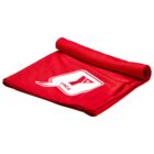 A neatly folded red mat with the YMCA logo printed in white. The fabric is rolled at one end and appears soft and flexible.