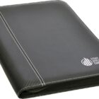 A black leather-bound portfolio with white stitching and a zipper closure. It features the Estate Development Company logo in white on the front cover.