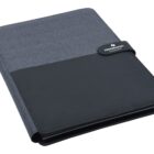 A gray and black combination folder with a textured fabric cover and a smooth black section. It features a tab labeled HINDMARSH Colour-Pop for closure.