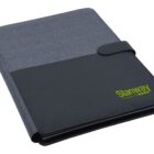 A closed grey and black fabric-bound folder with a magnetic clasp. The word Stanway is printed in yellow on the black section of the cover.