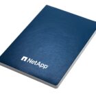Blue notebook with a white NetApp logo on the cover.