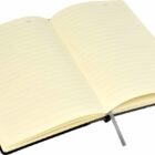 Open notebook with lined pages, featuring a black cover and a gray ribbon bookmark placed in the center, lying flat on a white background.