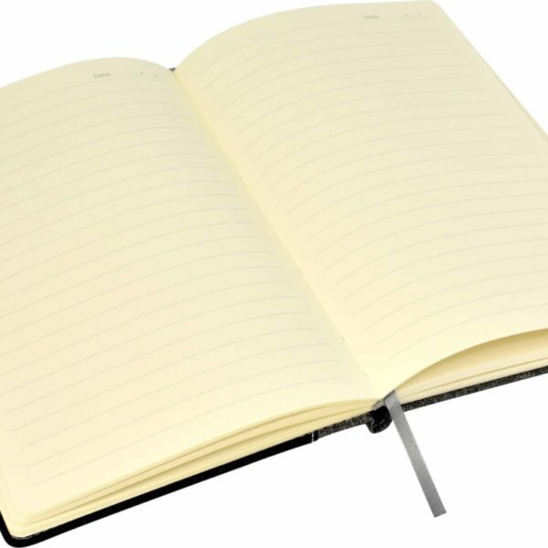 Open notebook with lined pages, featuring a black cover and a gray ribbon bookmark placed in the center, lying flat on a white background.