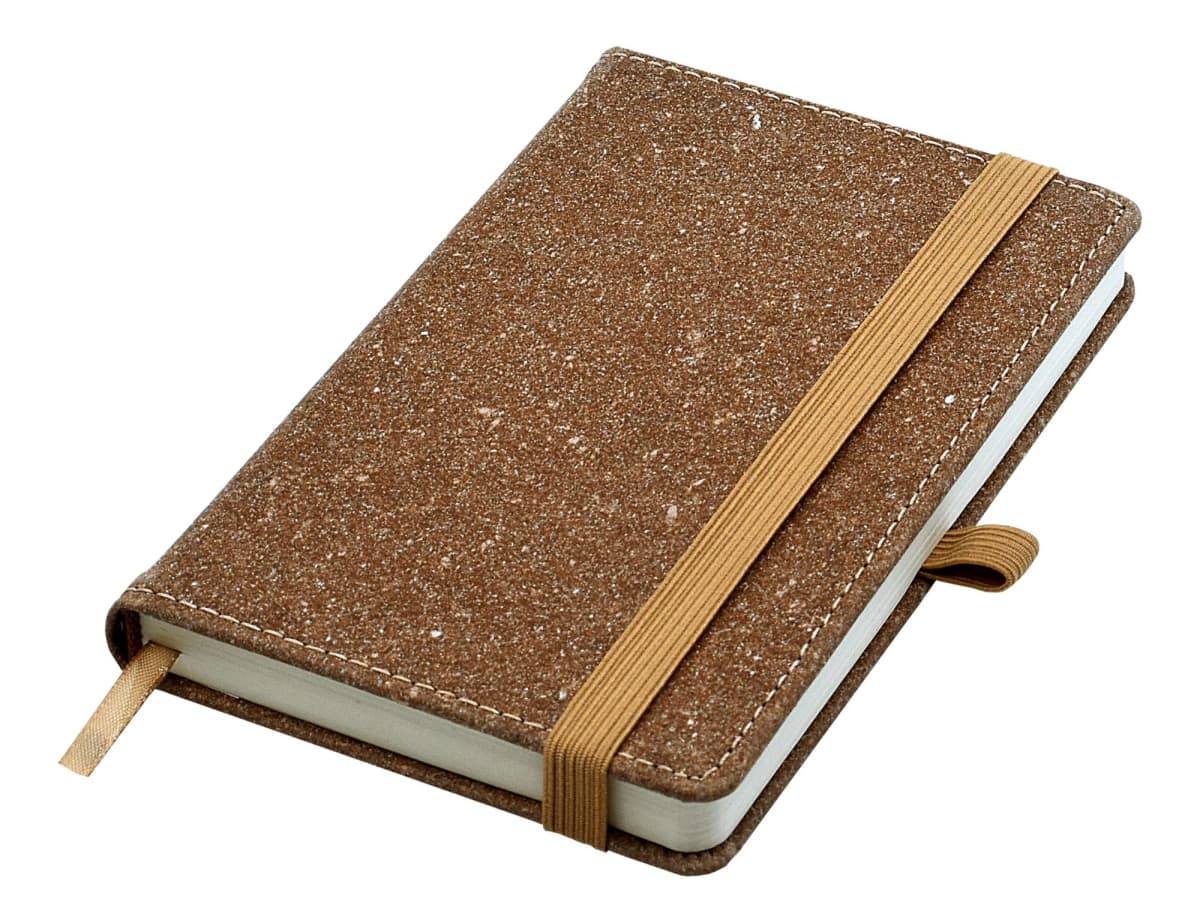 A brown textured hardcover notebook with an elastic band closure and a ribbon bookmark lies closed on a white background.