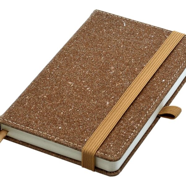 A closed brown speckled notebook with an elastic band around it, featuring a ribbon bookmark and a pen loop on the side.