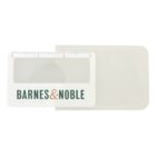 A magnifying sheet with a transparent center and a ruler on top, featuring Barnes & Noble text. It is partially slid out of a white protective sleeve.