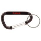 A black carabiner with a silver gate and key ring. The carabiner is branded with Canon in red letters.