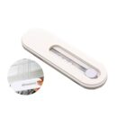 Rectangular white shower head cleaner with a built-in brush. Inset shows the tool in use, cleaning a shower head stream.