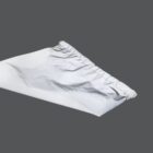 A white, crumpled paper sheet on a solid dark gray background.