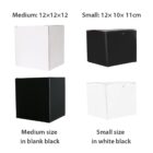 Image showing four boxes. Top left: medium, white, 12x12x12 cm. Top right: small, black, 12x10x11 cm. Bottom left: medium, black, 12x12x12 cm. Bottom right: small, white, 12x10x11 cm.