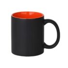 A black ceramic mug with a glossy orange interior, featuring a classic shape with a wide handle on the right side. The mug is plain with no additional designs or logos.