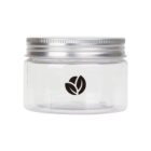 A clear glass jar with a silver metal screw-top lid, featuring a black leaf logo on the front. The jar is empty and isolated on a white background.
