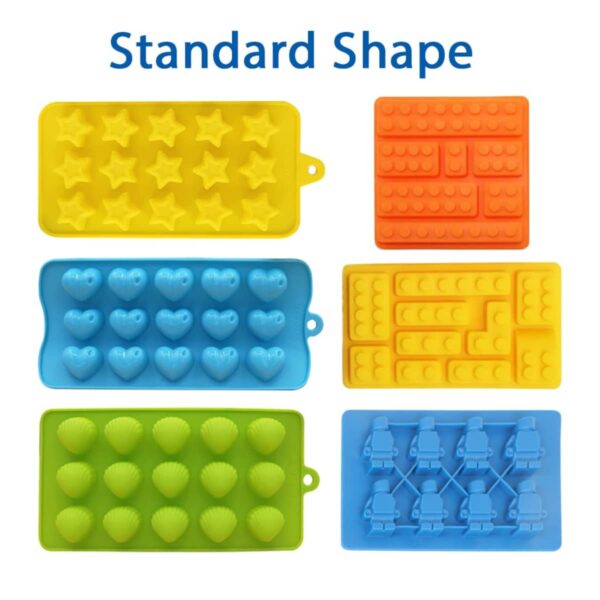 Six silicone molds are displayed. They feature shapes: stars, building blocks, hearts, bricks, seashells, and small robots. The molds are in yellow, orange, blue, and green, with the words Standard Shape above them.