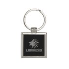 Silver keychain with a square black center featuring a stylized lion head logo above the word LIONHEAD.