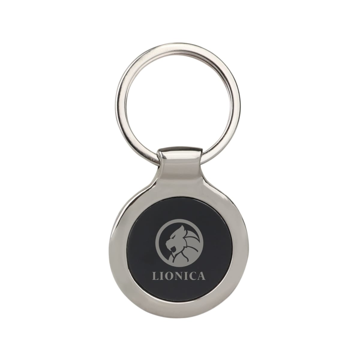 Silver keychain with a round, black center featuring a stylized lion logo and the text LIONICA beneath it.