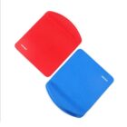 Two ergonomic mouse pads are shown on a white background. One is red and the other is blue, both with integrated wrist rests. They are positioned diagonally, with their corners nearly touching.