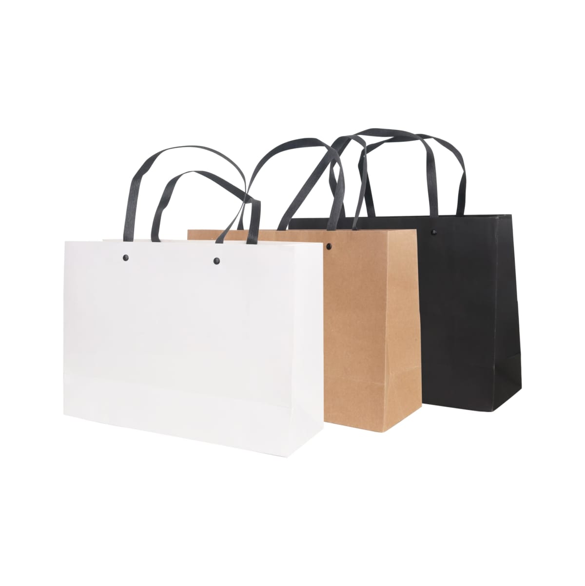 Three shopping bags with handles lined up side by side. The bags are in different colors: white, brown, and black. They each have a rectangular shape and appear to be made of sturdy paper.