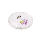 A small, round, transparent plastic container with a white lid featuring colorful text that reads Baby Shop and a logo of a cartoon baby. The lid includes a brown Dream Shule logo with a house and cloud design.